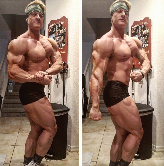 Tyler Garceau posing for the photo flexing his swole muscles