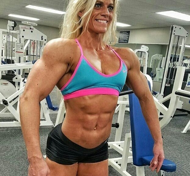 Autumn Swansen posing in front of the camera in the gym