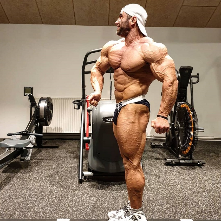 Ayat Bagheri posing for the photo looking ripped