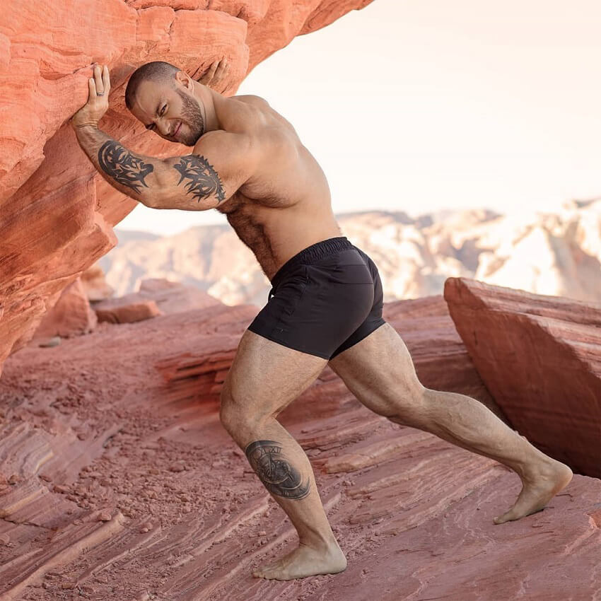 Caleb Blanchard jokingly trying to push a big rock