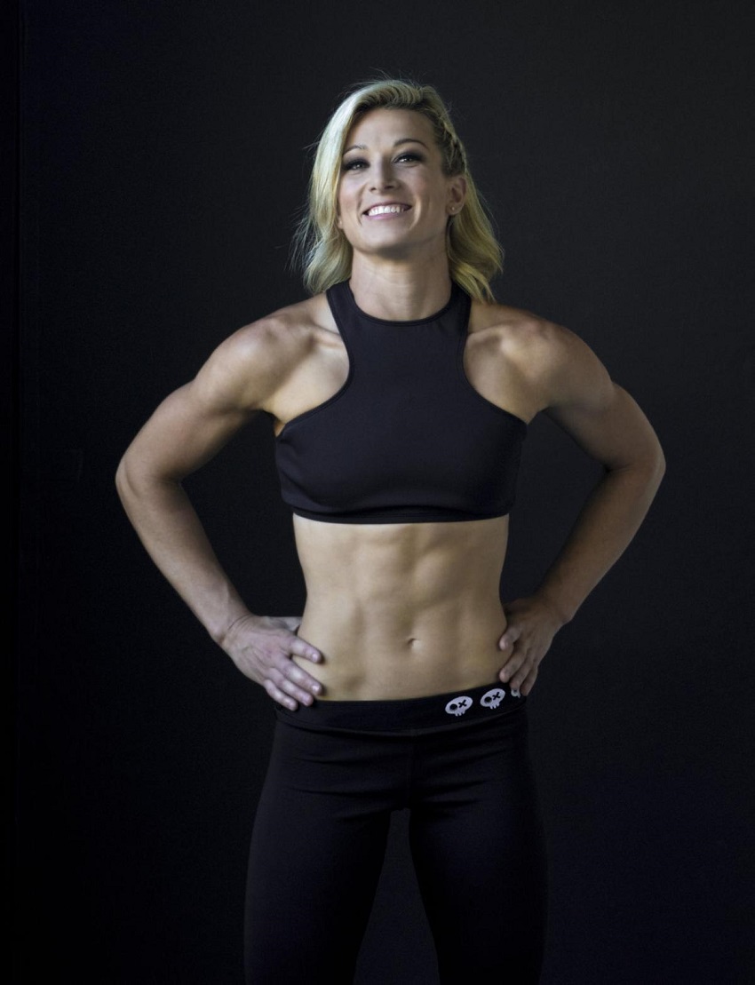 Jessie Graff smiling for the camera looking ripped