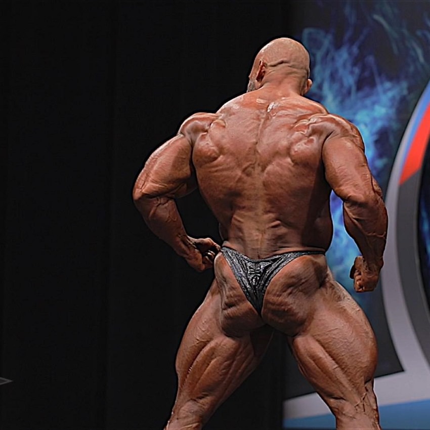 Alexis Rivera Rolon displaying his wide and muscular back on the bodybuilding stage