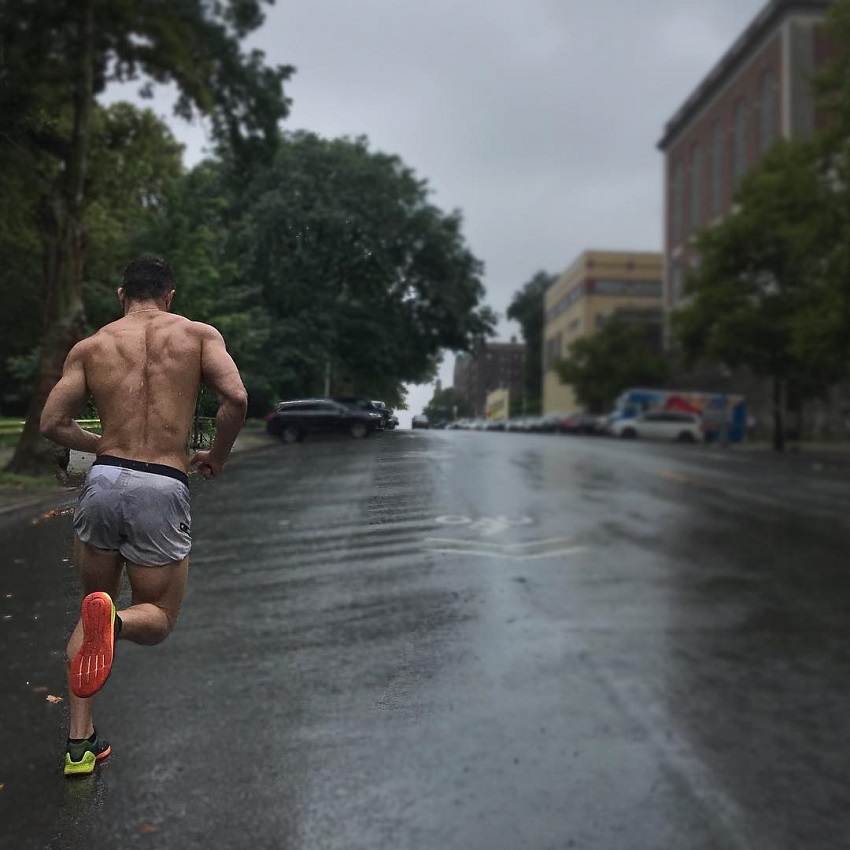 Bremen Menelli running shirtless down the street