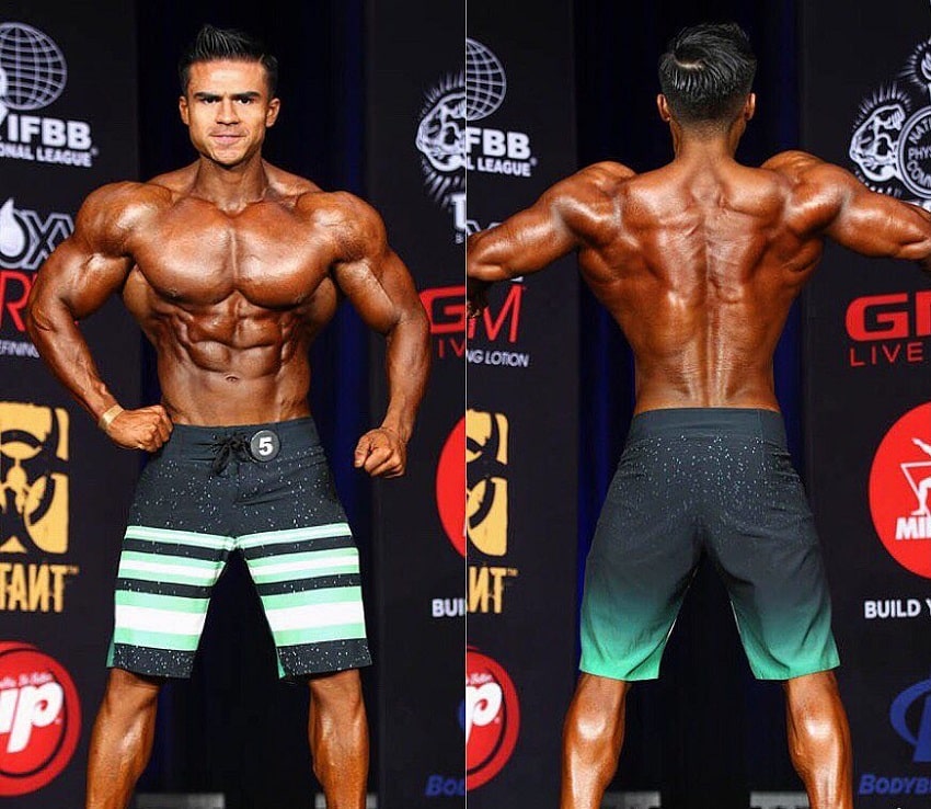 Ismael Martinez posing on the Men's Physique Olympia stage