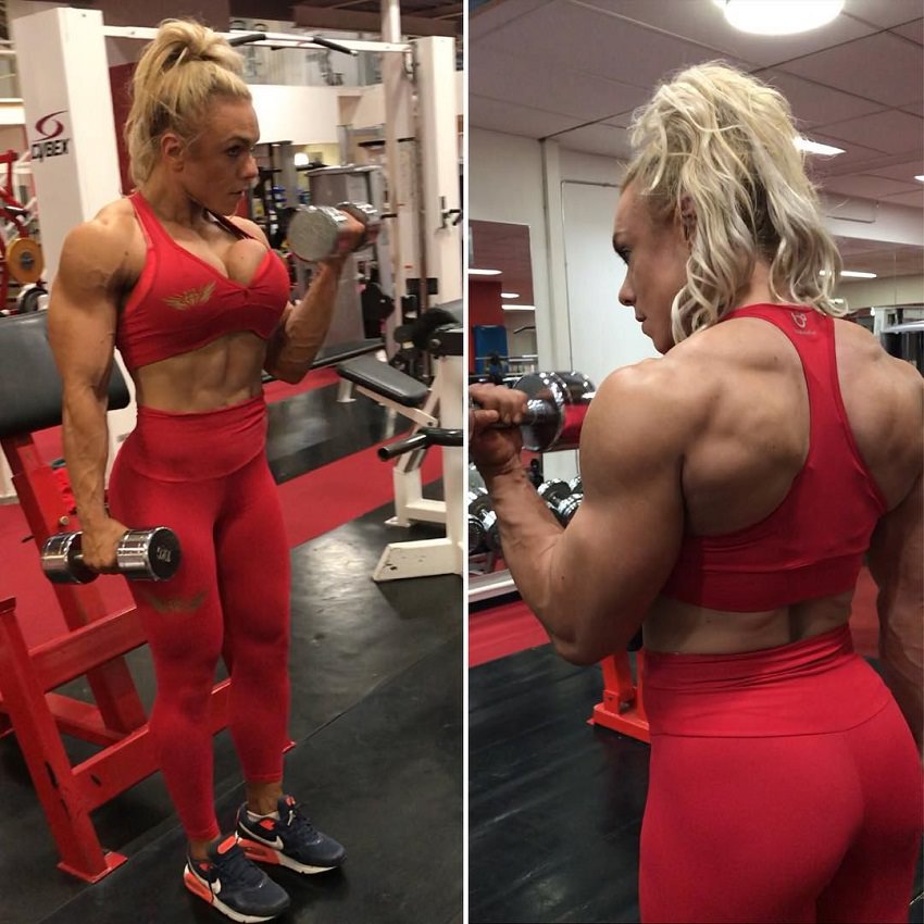 Minna Pajulahti doing biceps curls in a gym looking strong in her red gym outfit