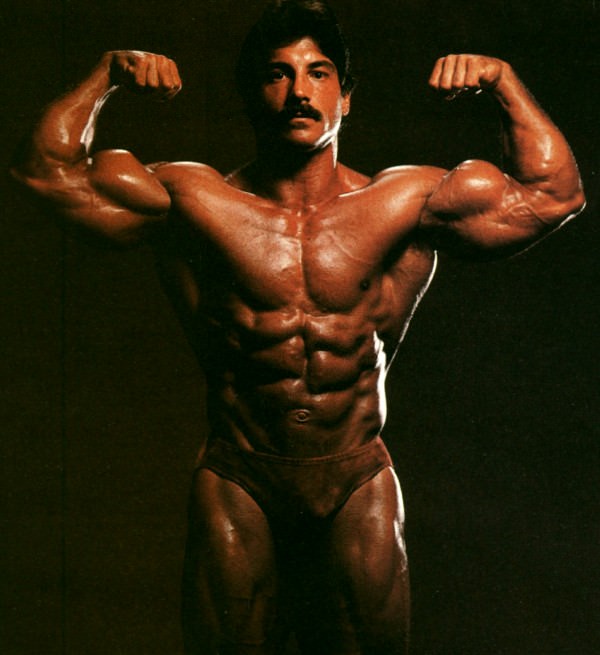 Ray Mentzer flexing his biceps for the photo