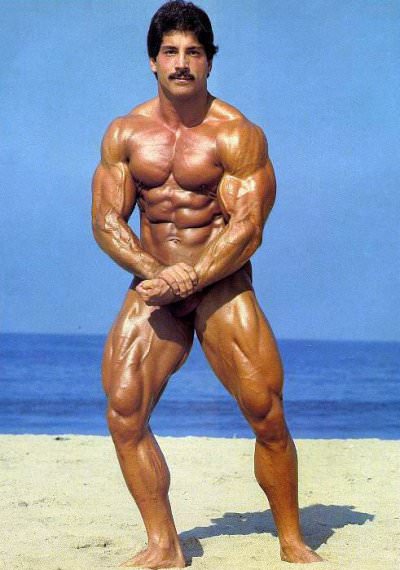 Ray Mentzer performing the most muscular pose on the beach