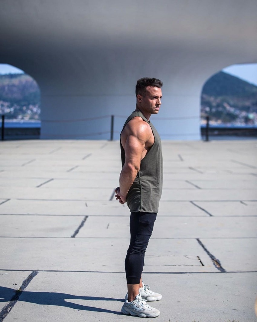 Diogo Montenegro posing outdoors in a tank top