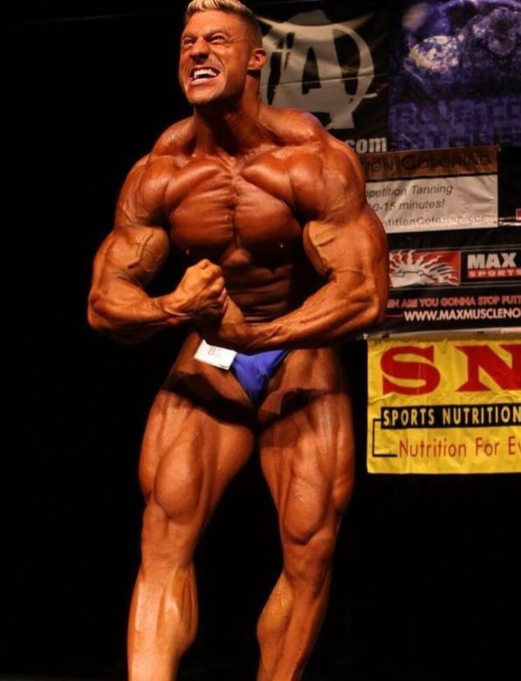 Gabe Moen performing the most muscular pose on the bodybuilding stage