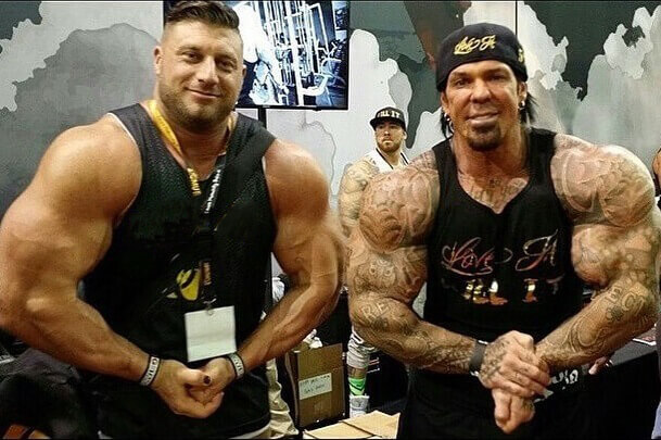 Gabe Moen posing with the late Rich Piana at a fitness expo