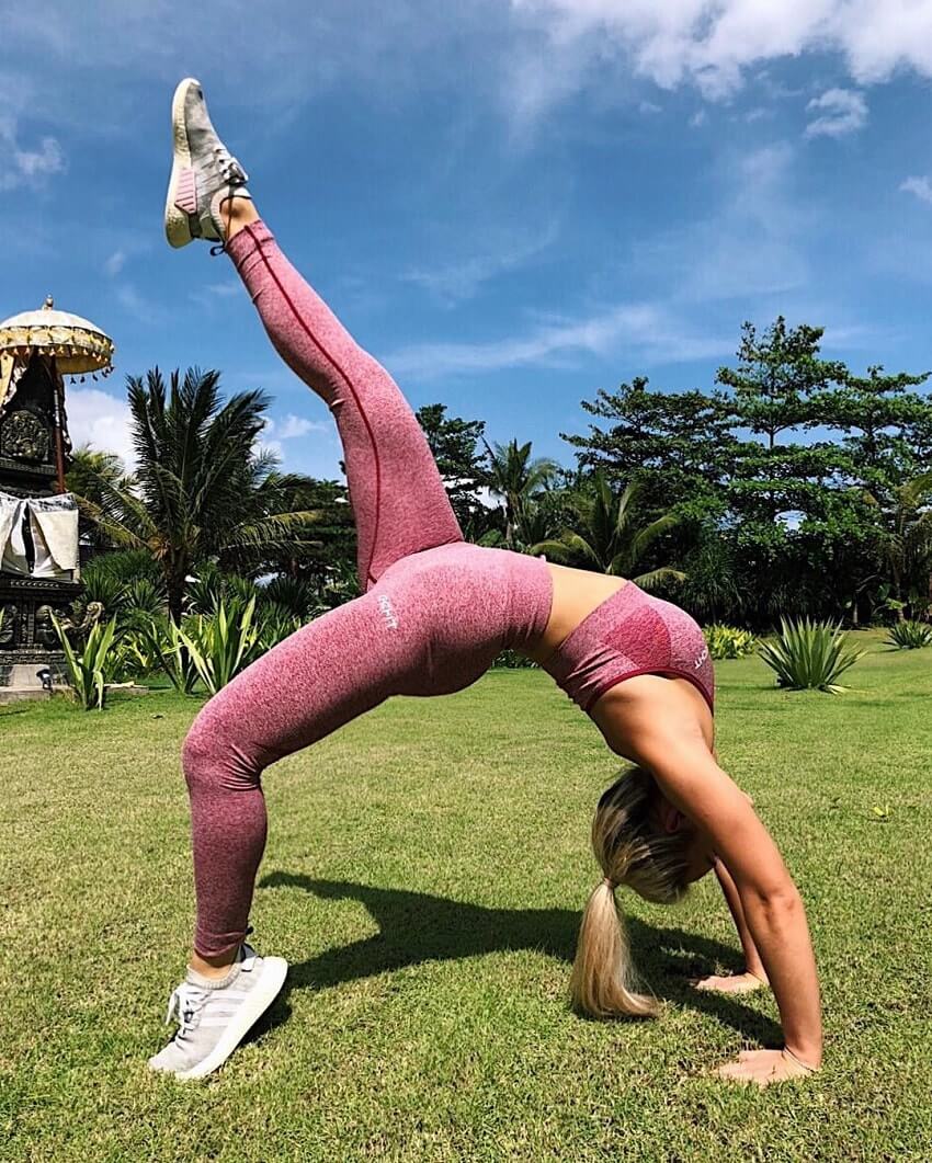 Georgie Stevenson doing acrobatics outdoors in her gym clothes