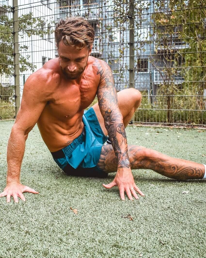 Matt Fox performing bodyweight workouts outdoors