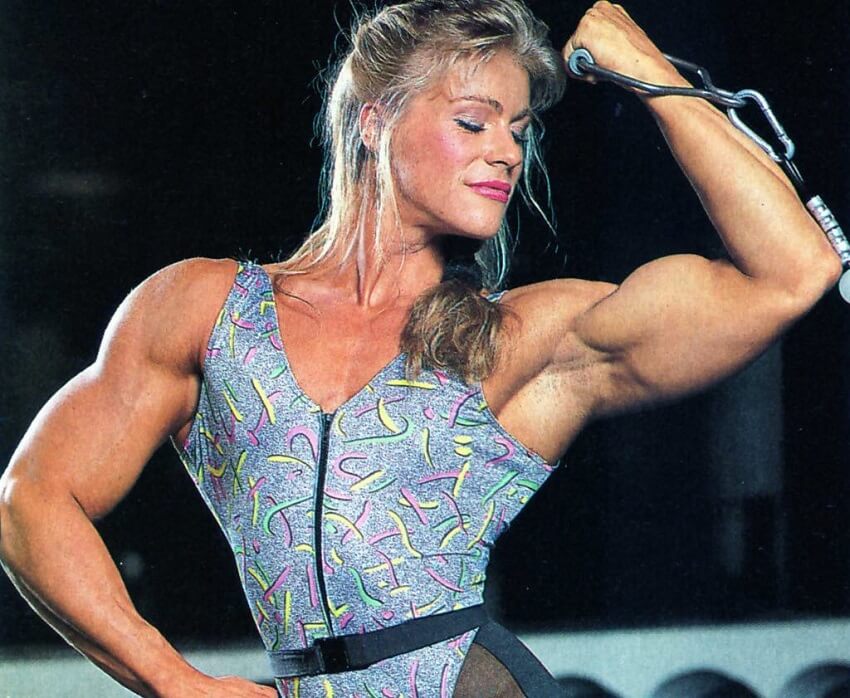 Anja Langer doing cable biceps curls