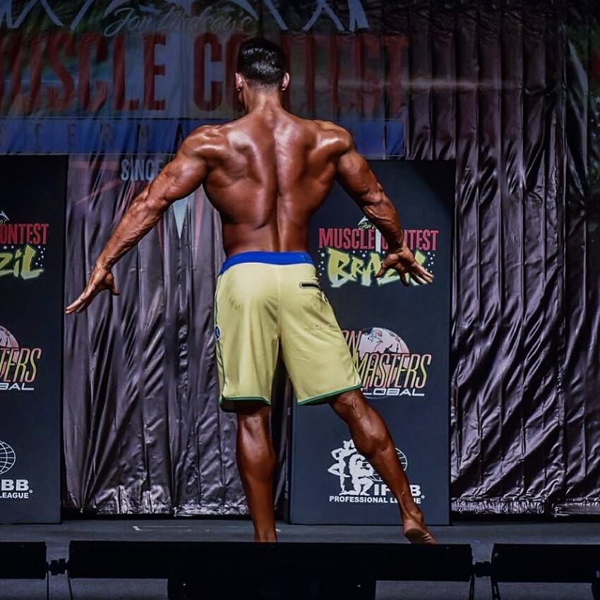 Felipe Franco flexing his back during a bodybuilding competition