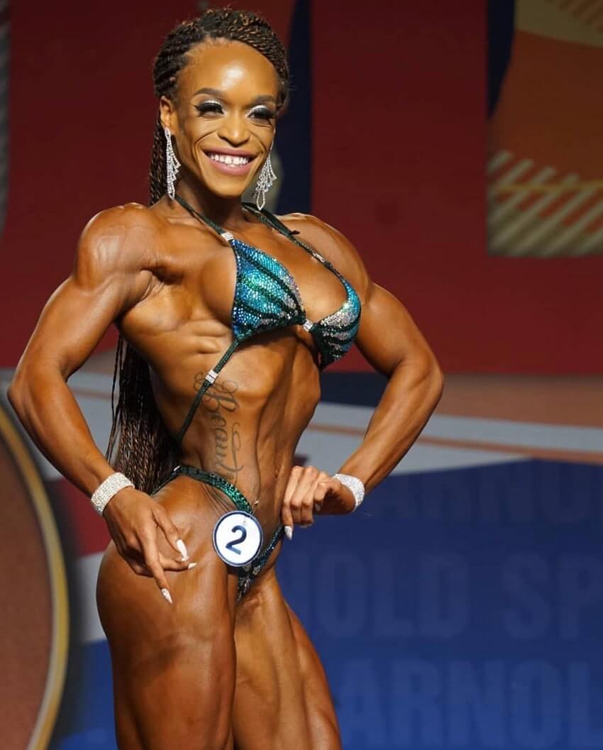 Lola Montez competing on a fitness and figure stage