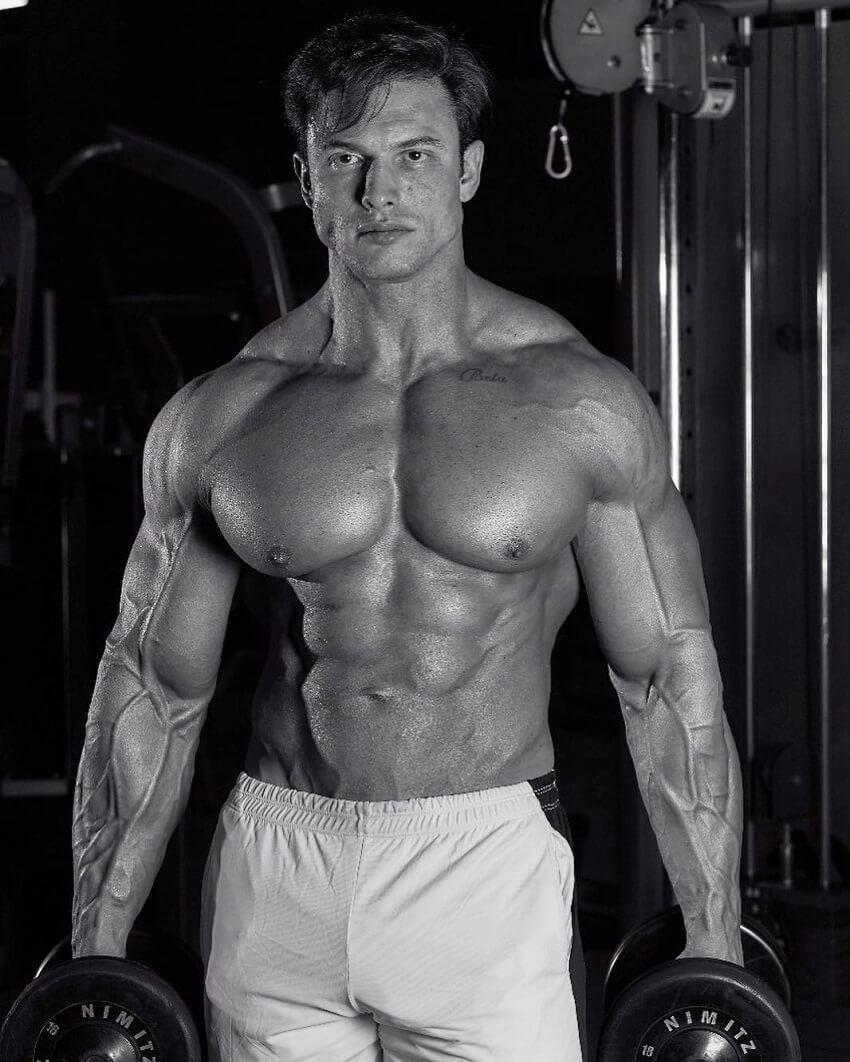 Paulo Muzy posing shirtless for a fitness photo shoot
