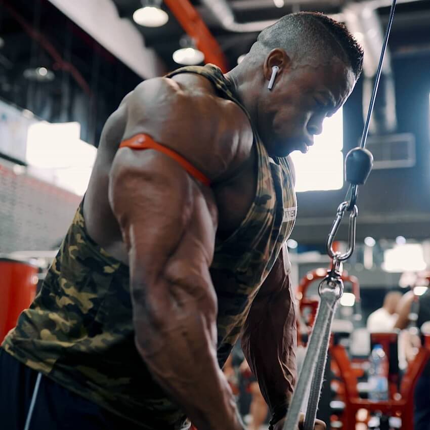 Ricardo Correia training his huge and muscular triceps in a gym