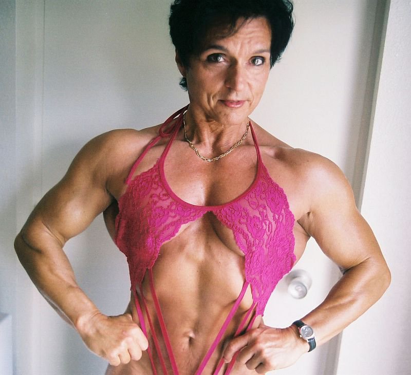 Christa Bauch posing for the photo looking fit and lean