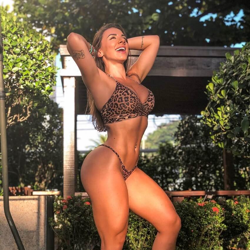 Fabriny Storck posing in a bikini looking curvy and fit