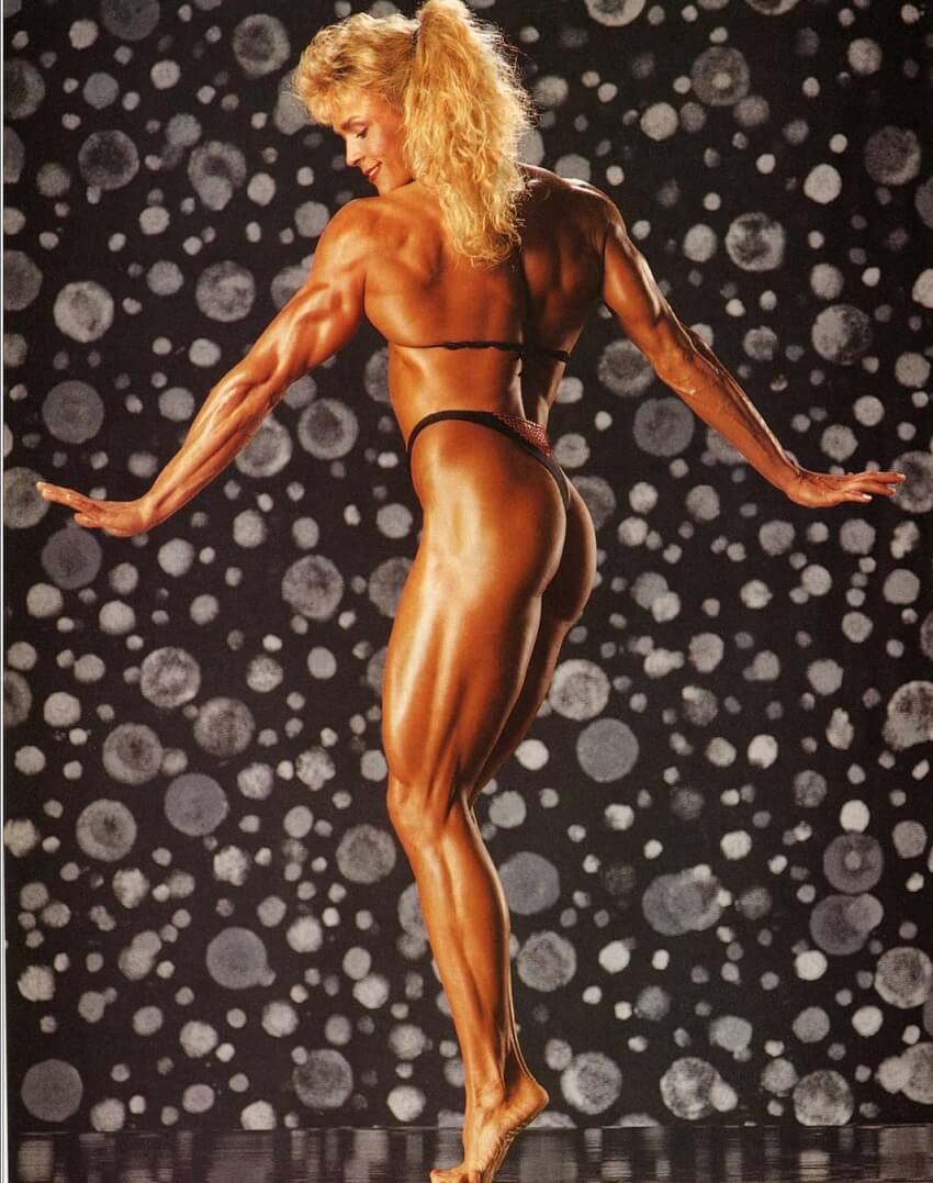 Tonya Knight showcasing her back, legs and glutes in a professional bodybuilding photo shoot