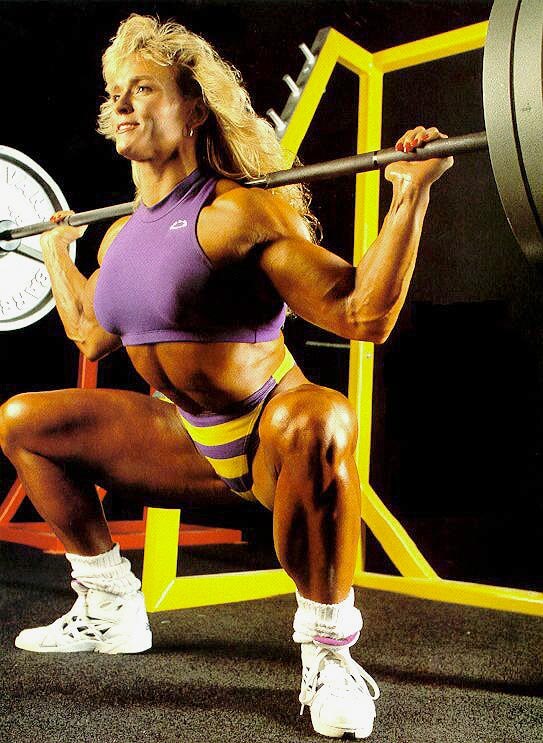 Tonya Knight doing squats in the gym