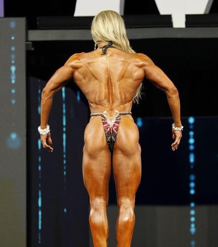 Whitney Jones showing off her ripped back and legs in a fitness contest