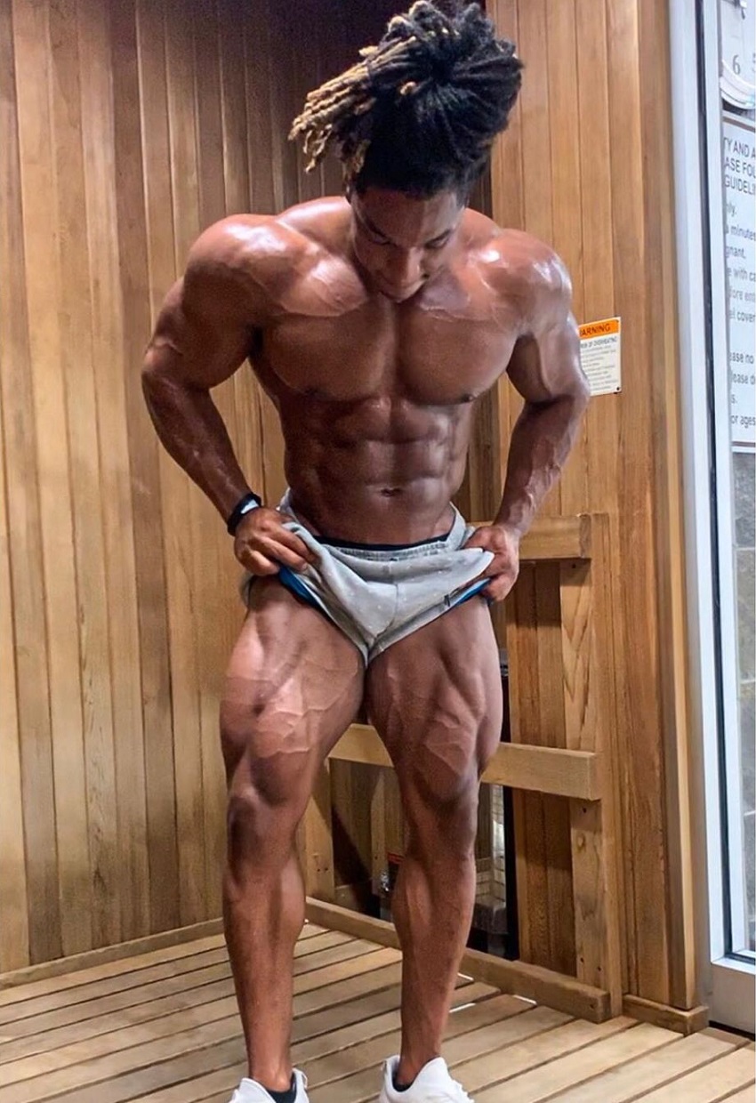 Jay Coss flexing his shredded legs