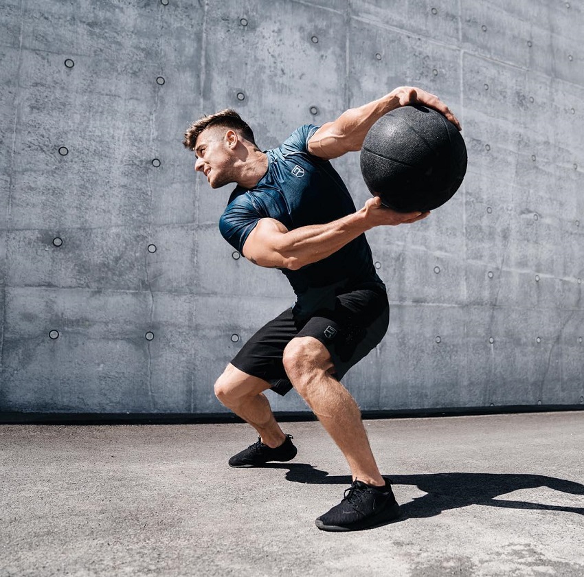 Bryan McCormick training with medicine ball