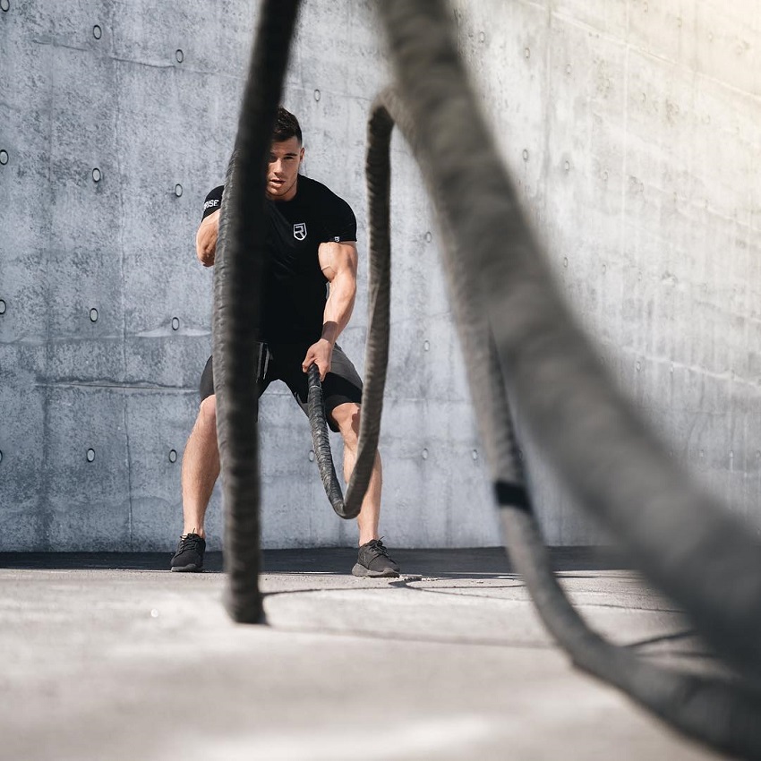 Bryan McCormick doing battle ropes