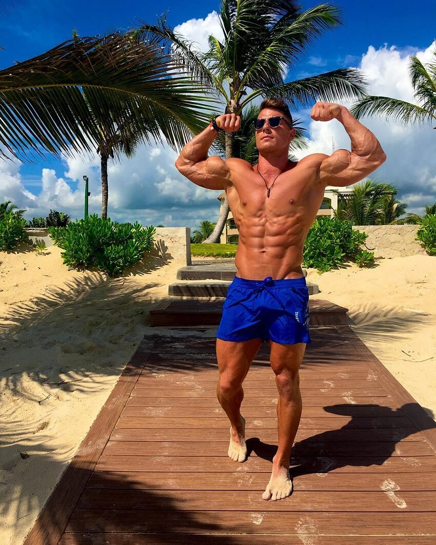 Bryan McCormick flexing his shredded muscles