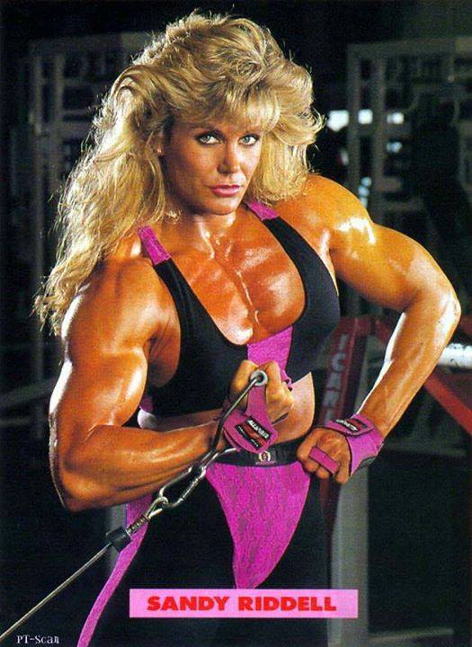 Sandy Riddell posing in a bodybuilding photo shoot