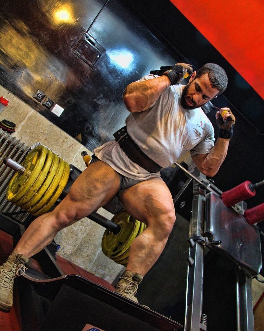 Mojtaba Notarki doing leg press in the gym