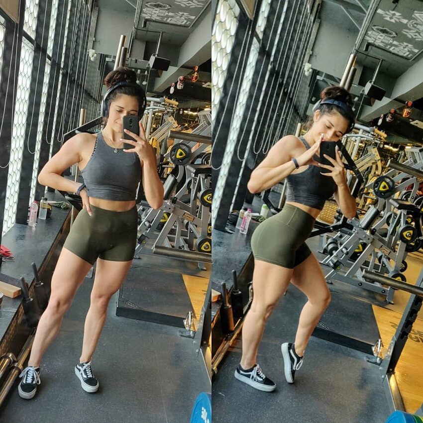 Annabel DaSilva taking a gym selfie looking fit and curvy