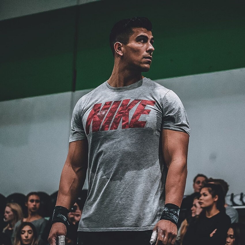 Garret Fisher in a Nike T shirt looking muscular and ripped