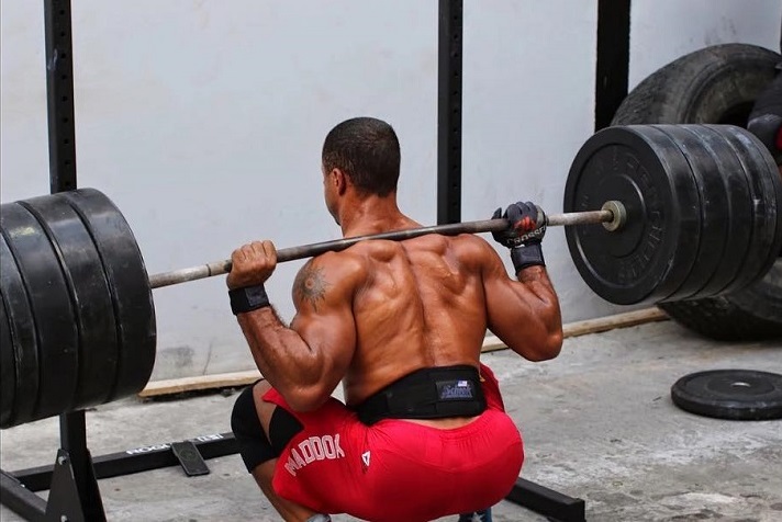 Neal Maddox doing squats