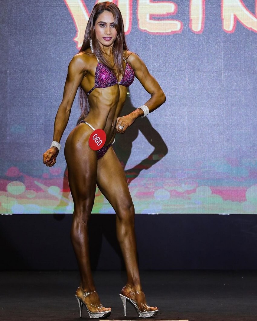 Vaishali Bhoir posing in a fitness bikini competition