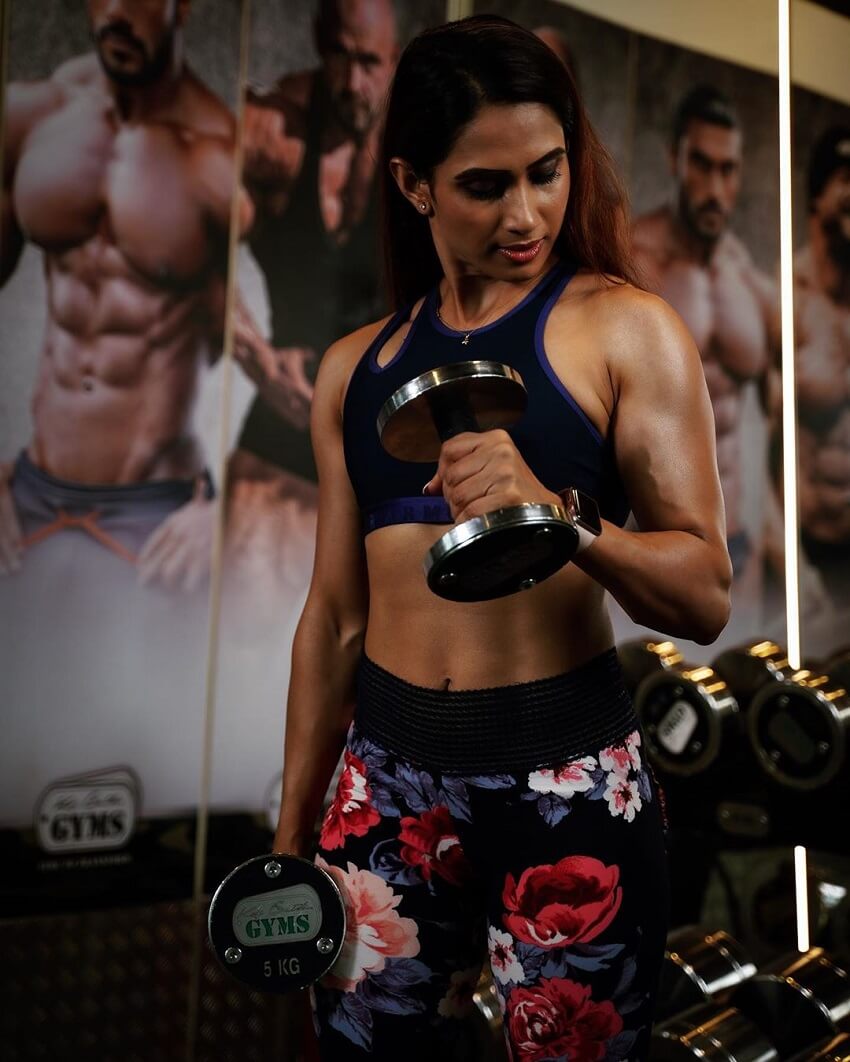 Vaishali Bhoir training her toned and strong biceps with dumbbells