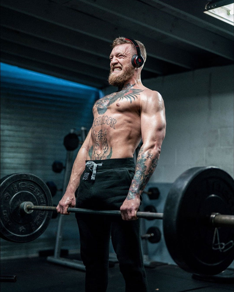 Conor McGregor lifting a barbell